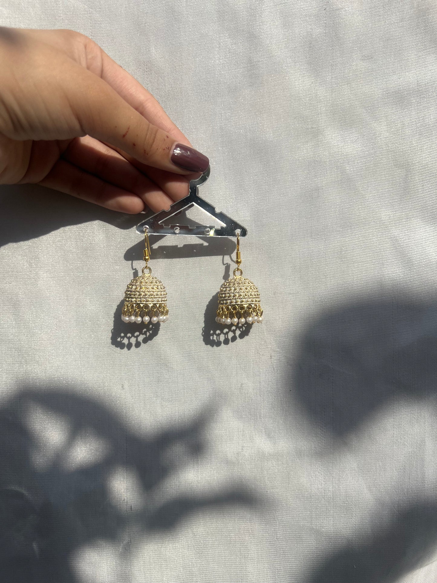 White golden jhumki