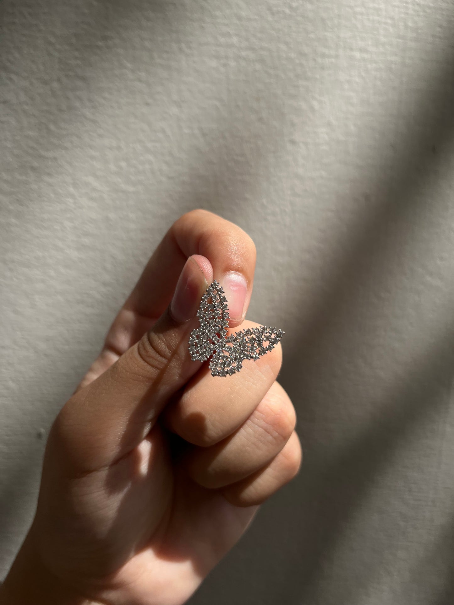 Silver butterfly earpieces