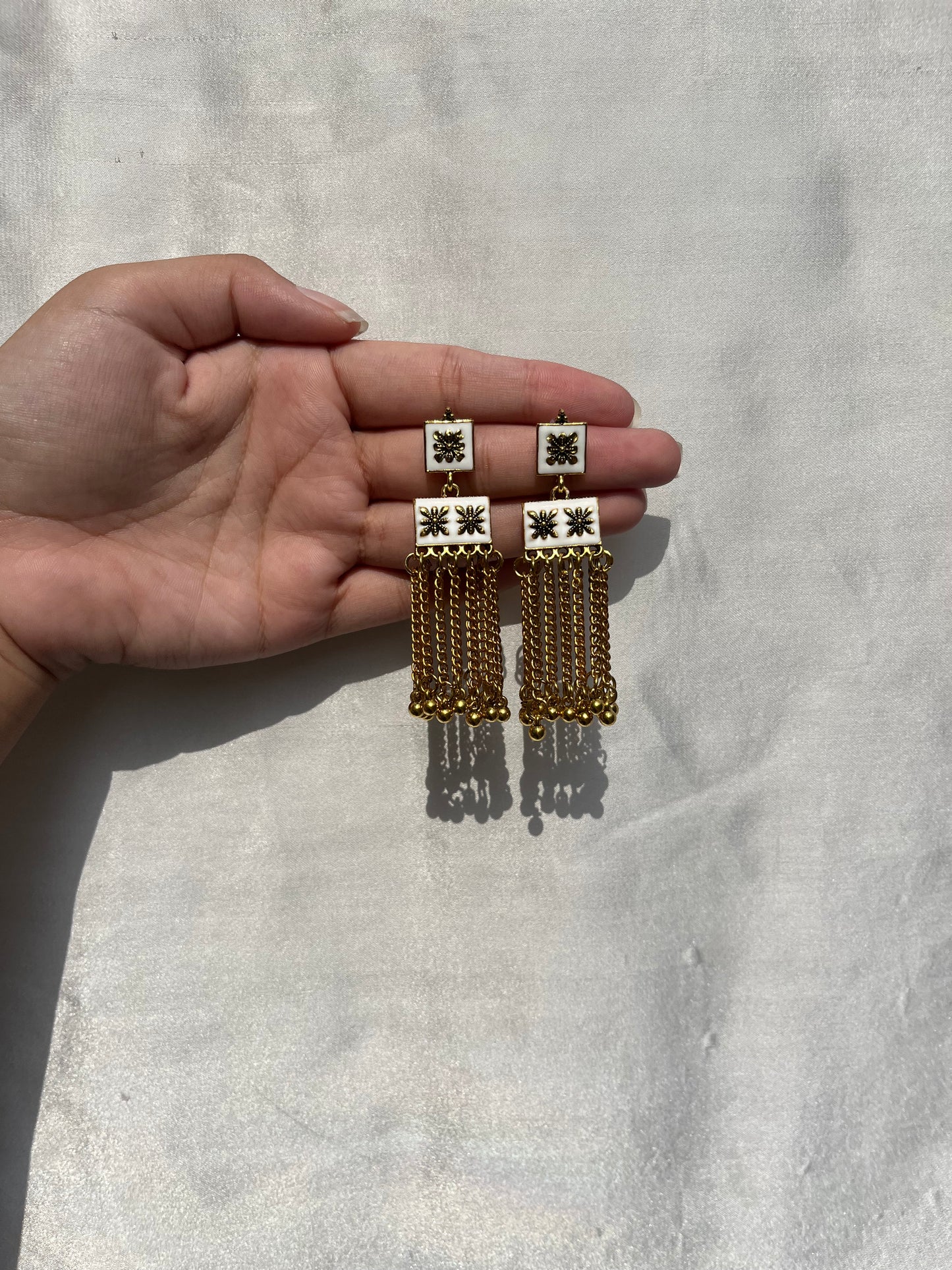 White earrings