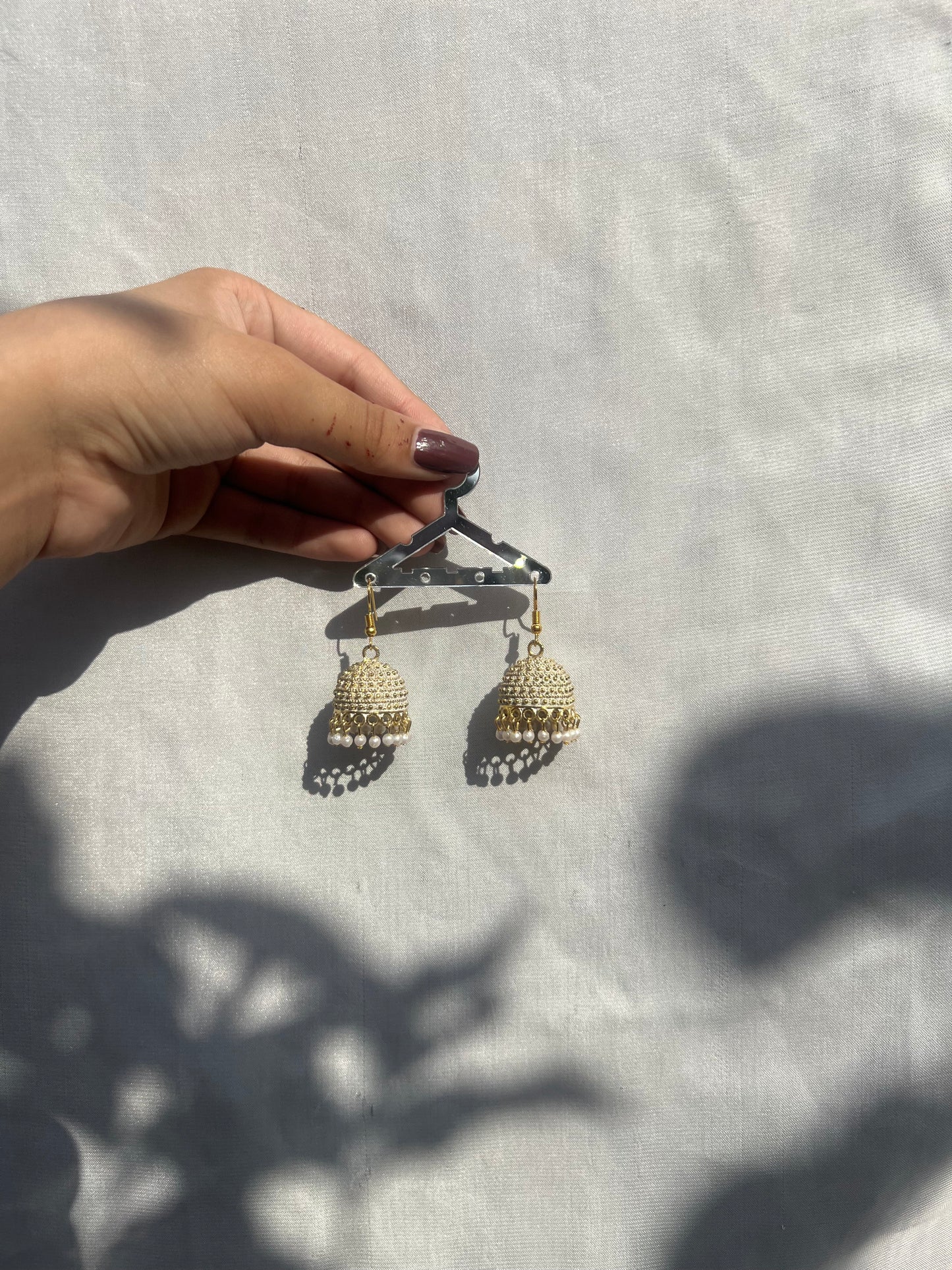 White golden jhumki
