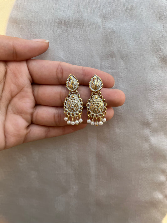 White and golden earpieces