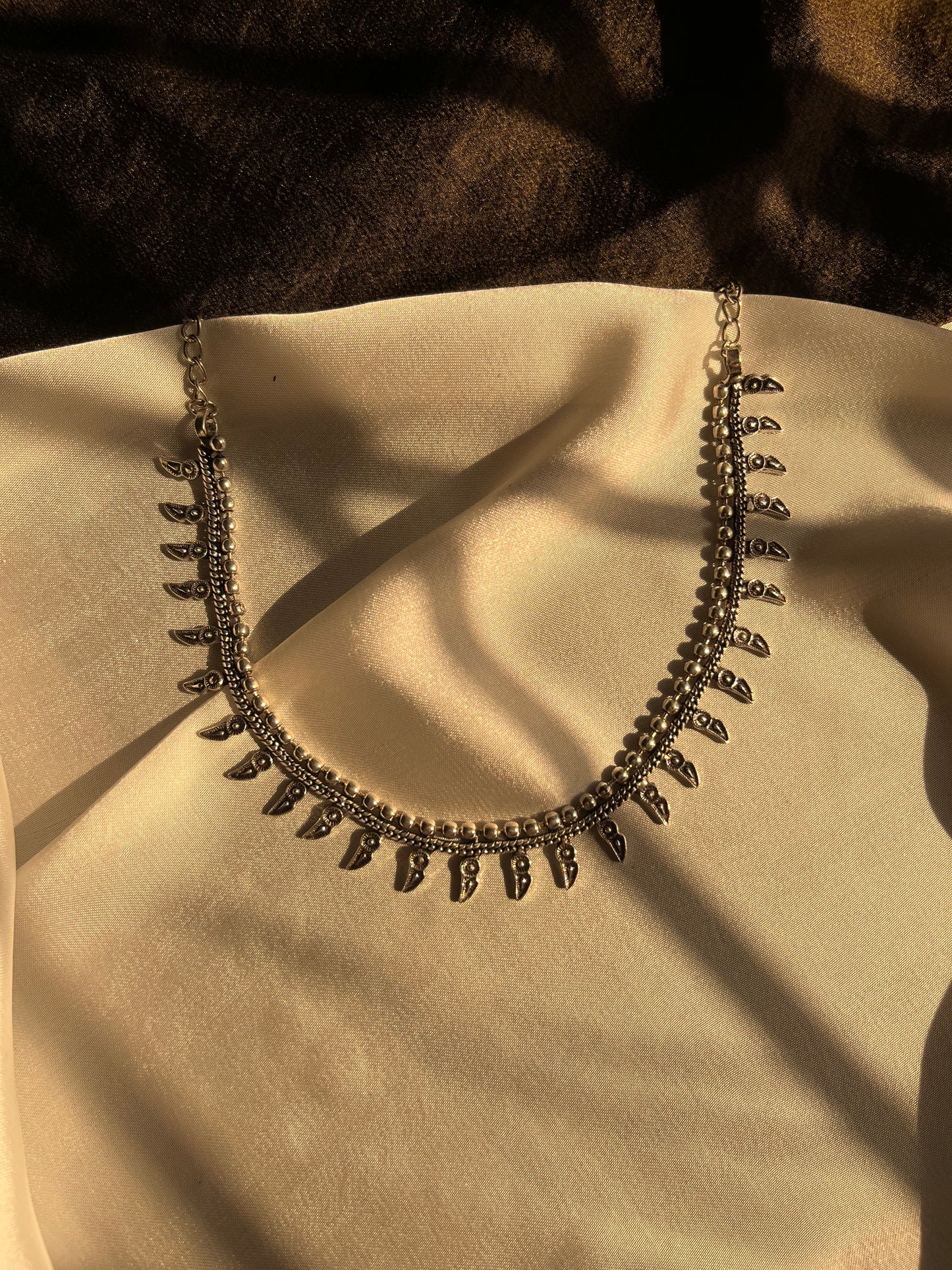 Simple afghan necklace