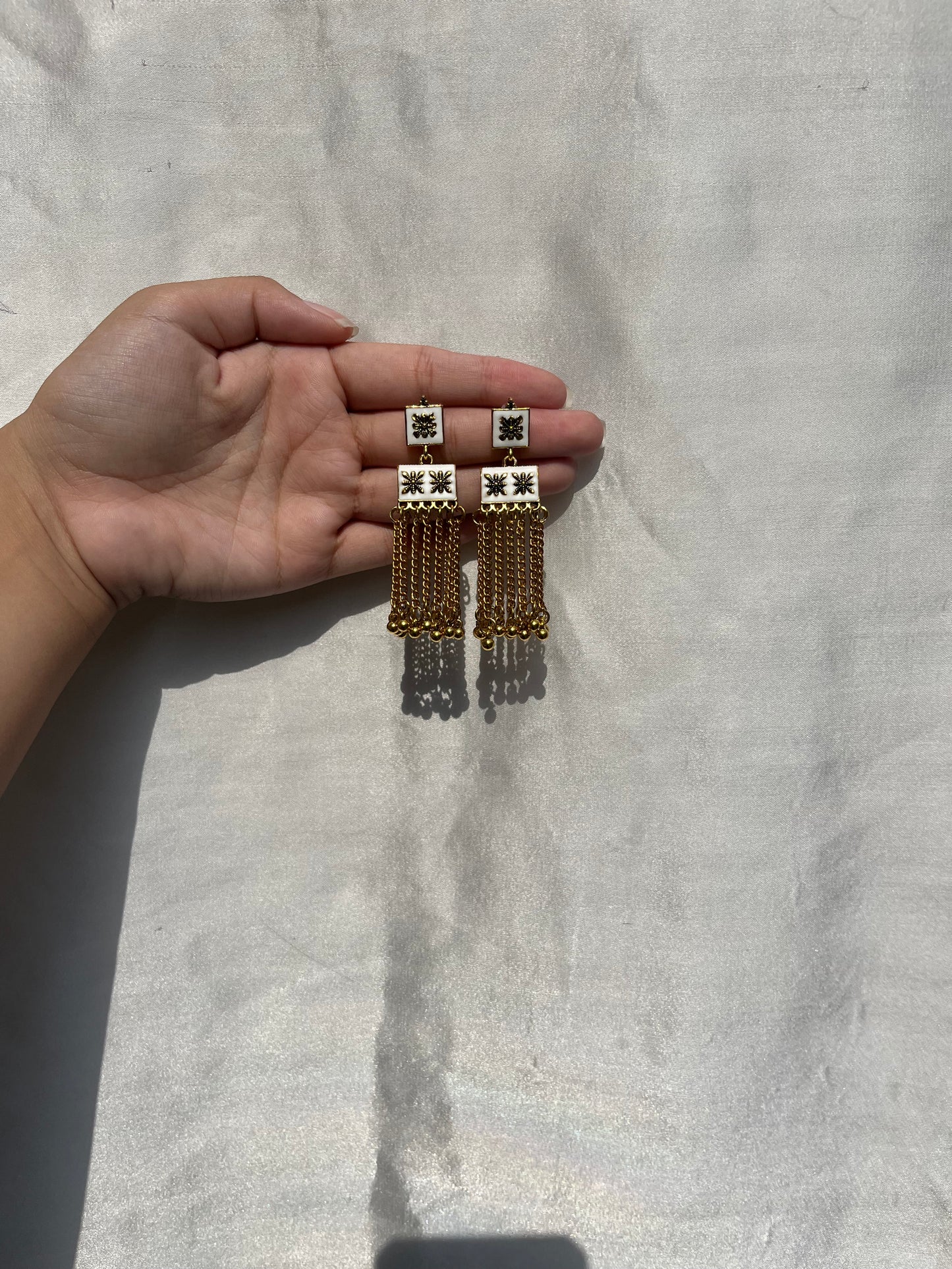 White earrings