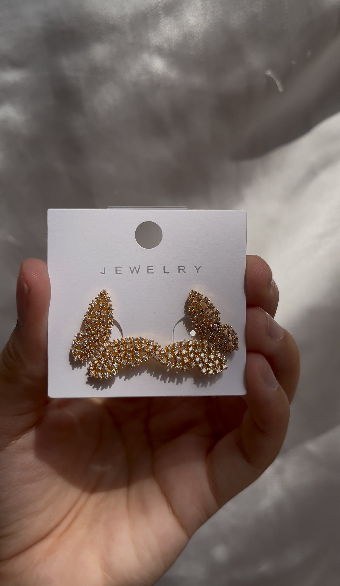 Golden butterfly earpieces