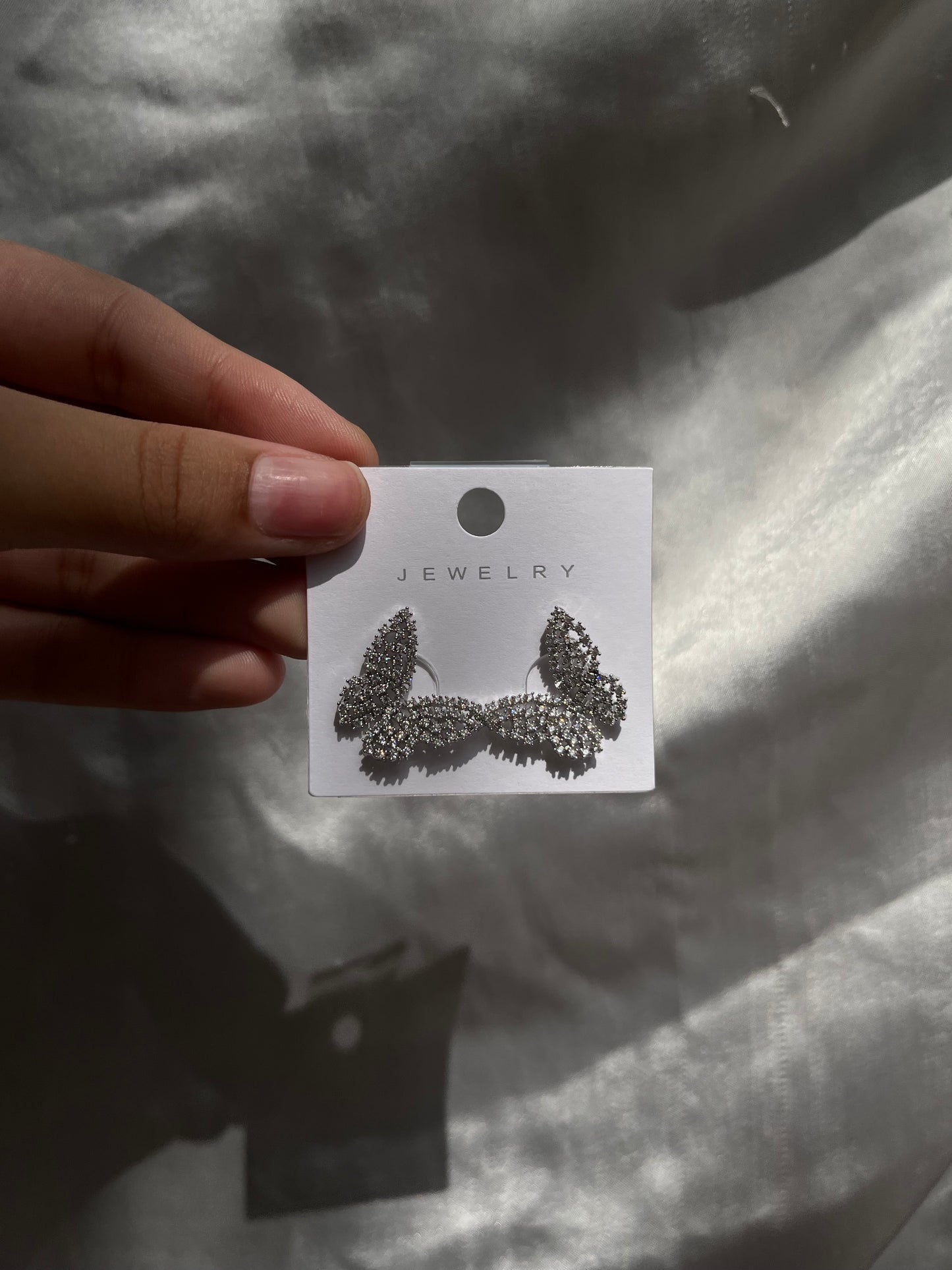 Silver butterfly earpieces