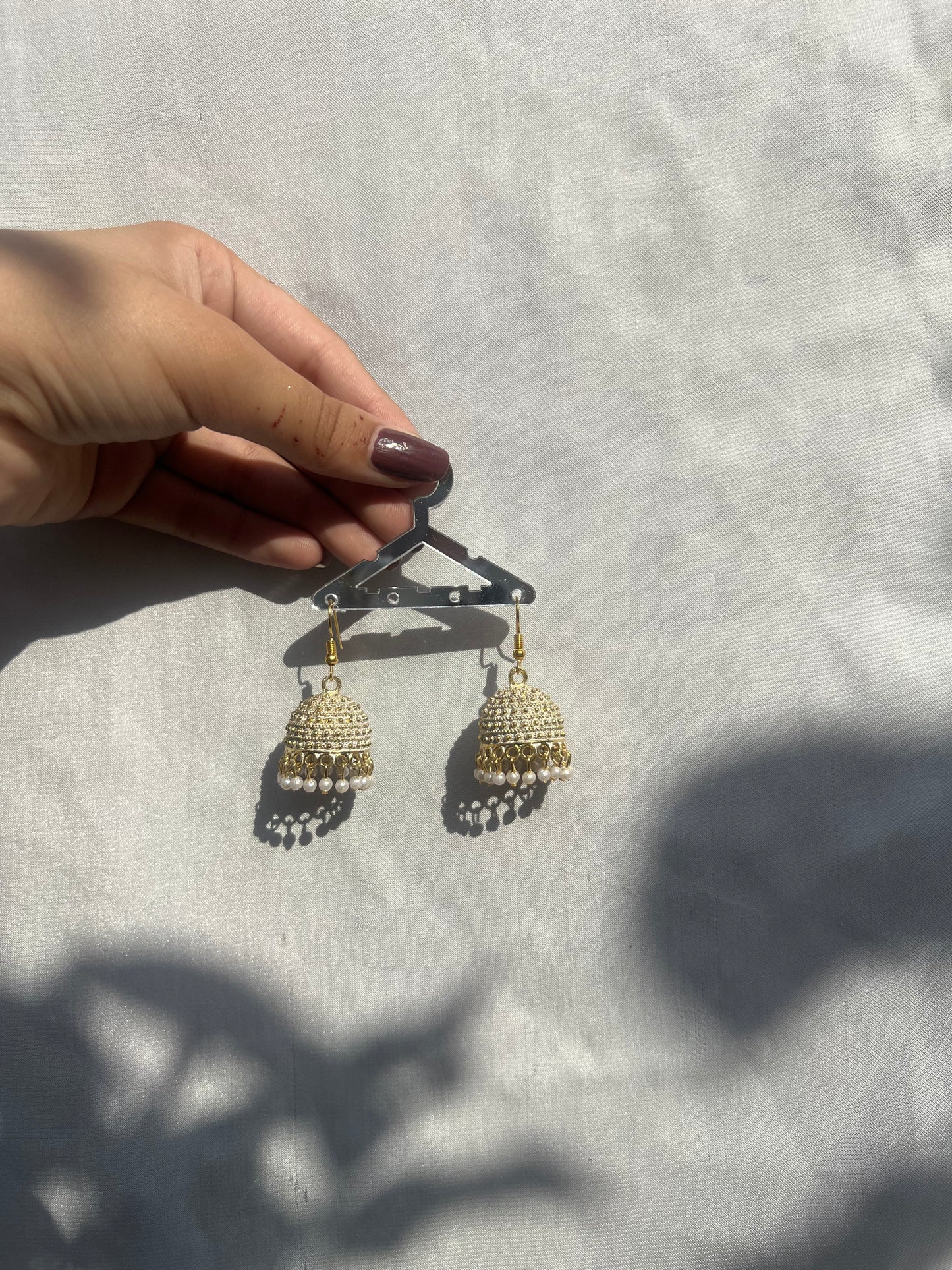 White golden jhumki