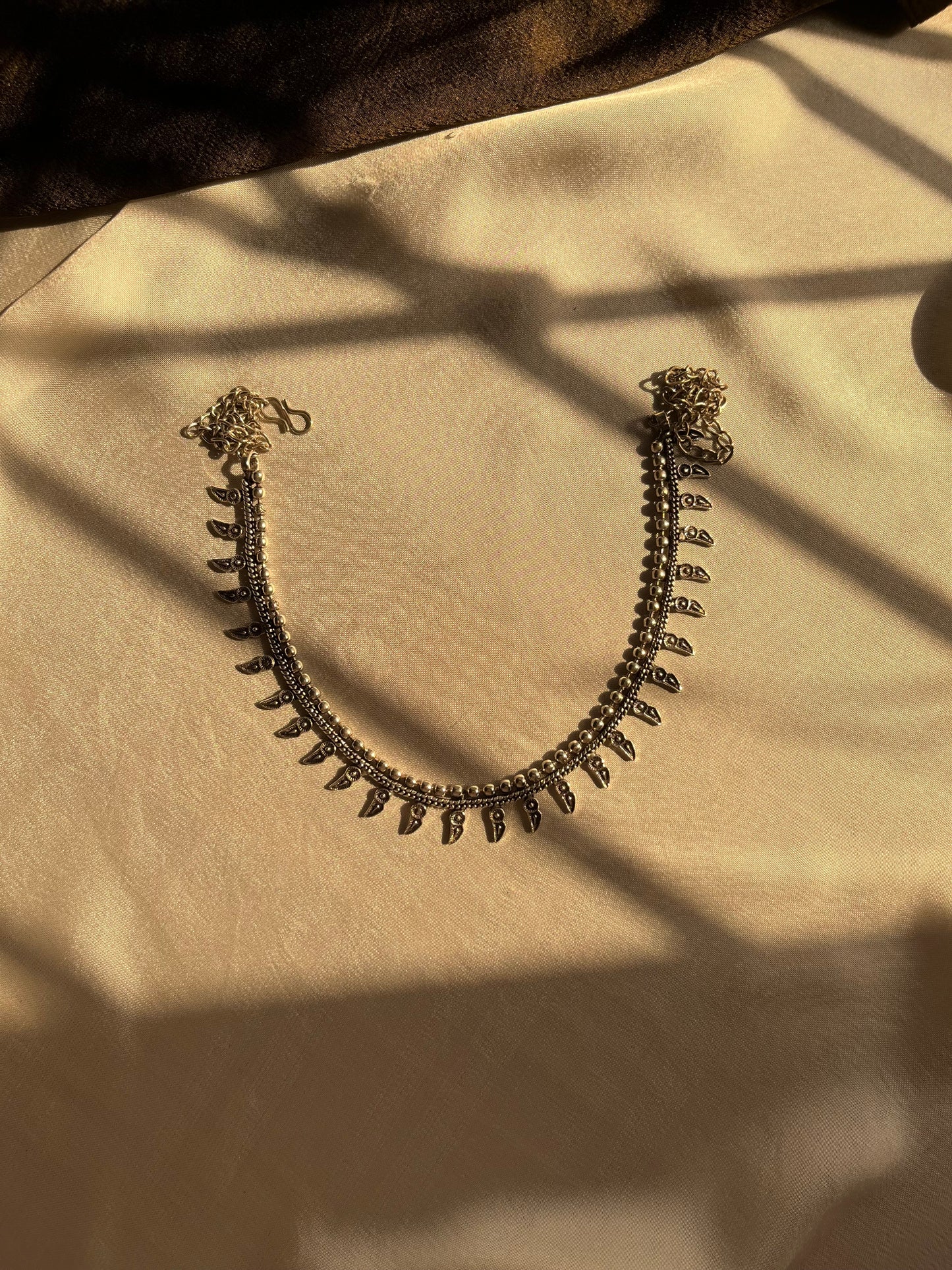 Simple afghan necklace