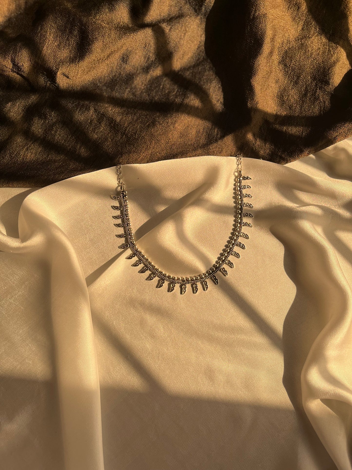 Simple afghan necklace